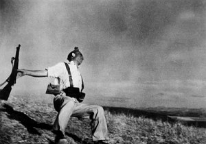 Death of a Loyalist Militiaman, Córdoba Front by Robert Capa. (Gelatin silver print. Late August-Early September 1936. Museum of Modern Art, NY.)