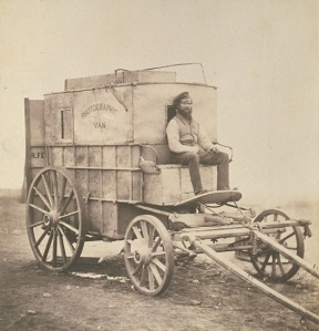 Roger Fentons Photographic Van (Salted Paper Print. ca. 1855. Royal Photographic Society Collection.) Fenton was sponsored and equipped by the British Government to document the Crimean War. That war was exceedingly unpopular among the public and Fenton, as a result, avoided scenes of death, which would shortly become a staple of independent war photojournalists. Click to enlarge.